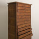 Solid wood column equipped with 20 drawers