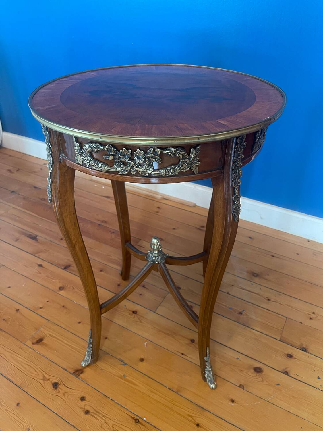 High wooden pedestal table