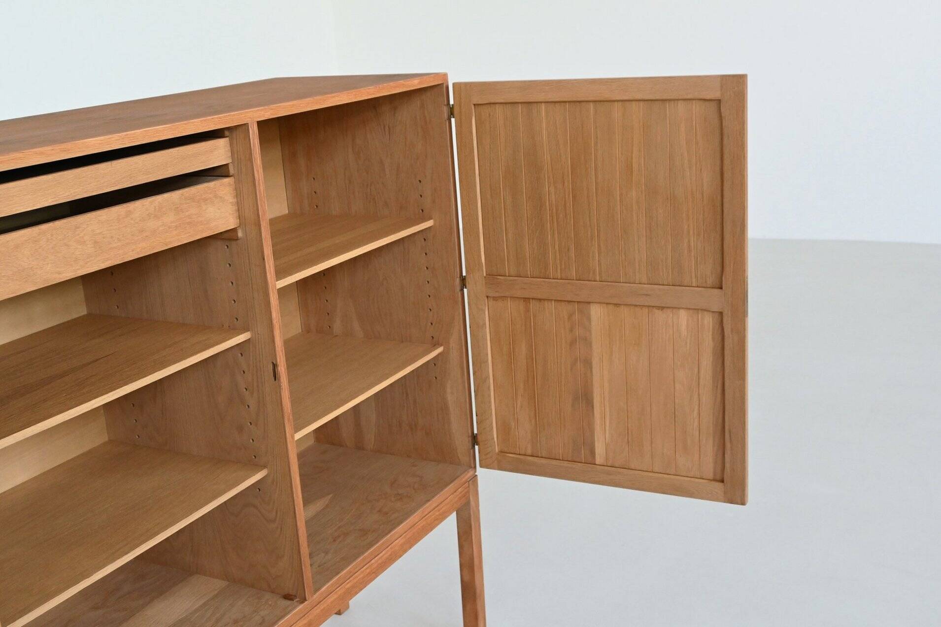 Kurt Ostervig high cabinet in oak A/S Randers Denmark 1960