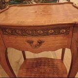 Pair of Louis XV style bedside tables with marquetry and bronze.