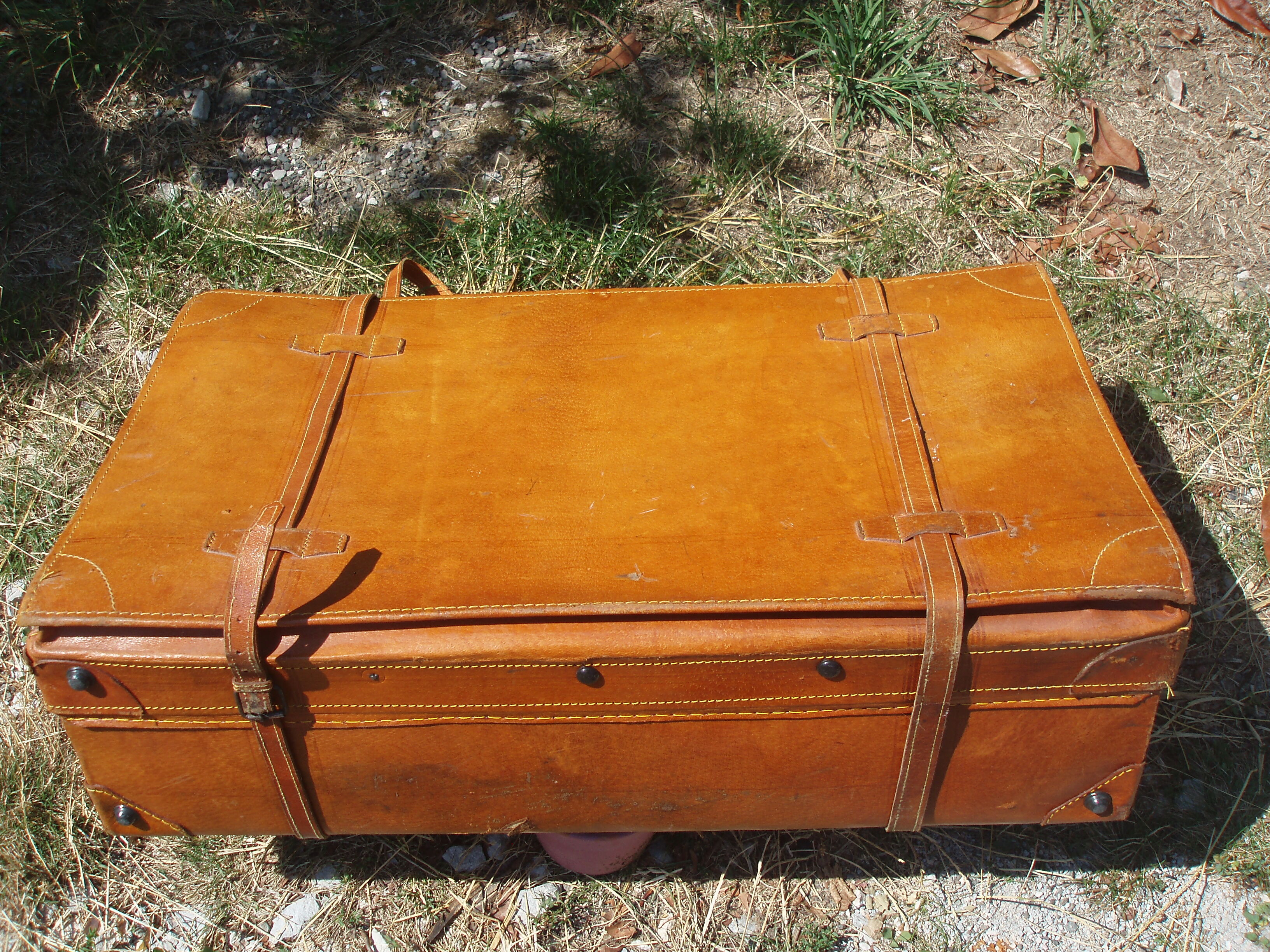Old quality brown leather suitcase from the 60s