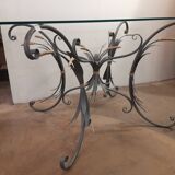 Glass top table with iron base in the style of wheat ears. Attributed to Robert Goossens.