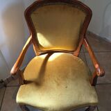 Yellow velvet armchair