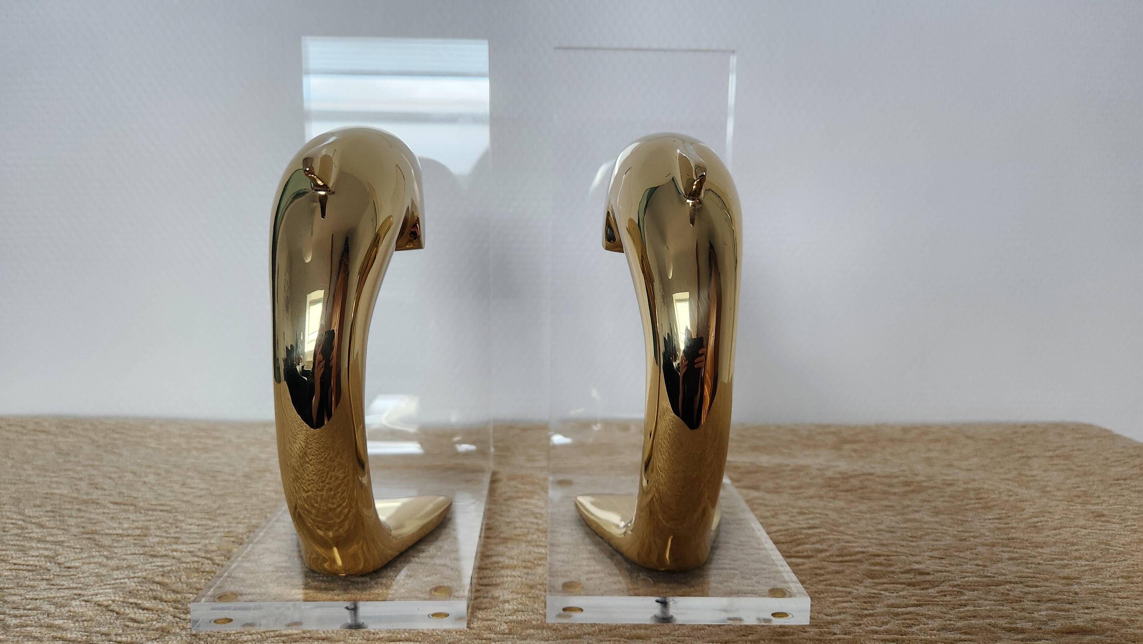 Dolphin bookends in gold metal and plexiglass – 1980s