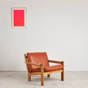 Brutalist armchair in oak and leather by Tage Poulsen, Denmark, 1970s.
