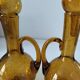 Duo of blown glass carafes – Biot signed – Bubbled amber glass