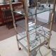 Glass and brass shelf on wheels