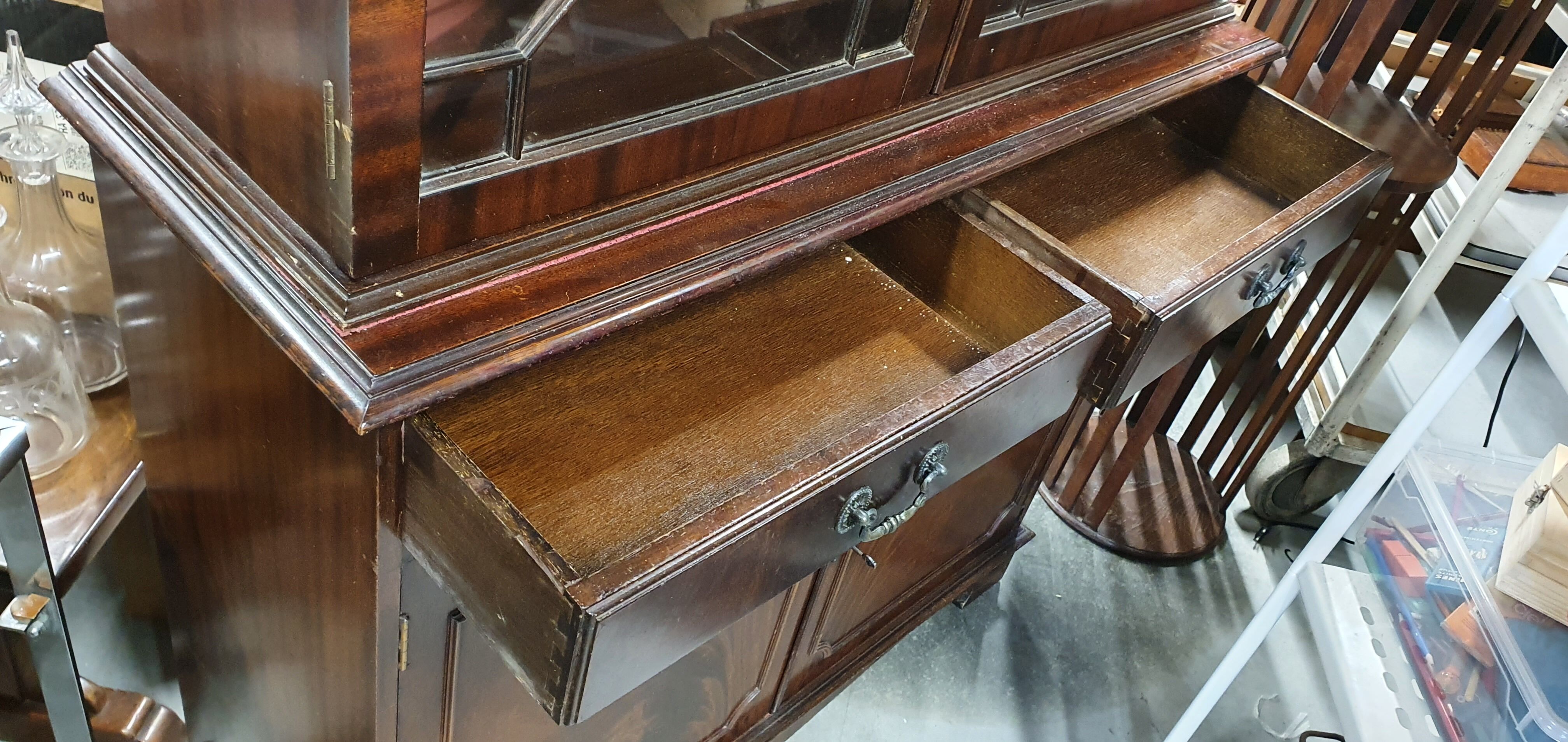 English showcase, two bodies, solid mahogany an of the 50s