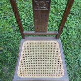 Pair of wooden and cane chairs