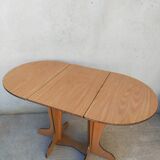 Oval table with formica flap