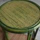 Green rattan side table.
