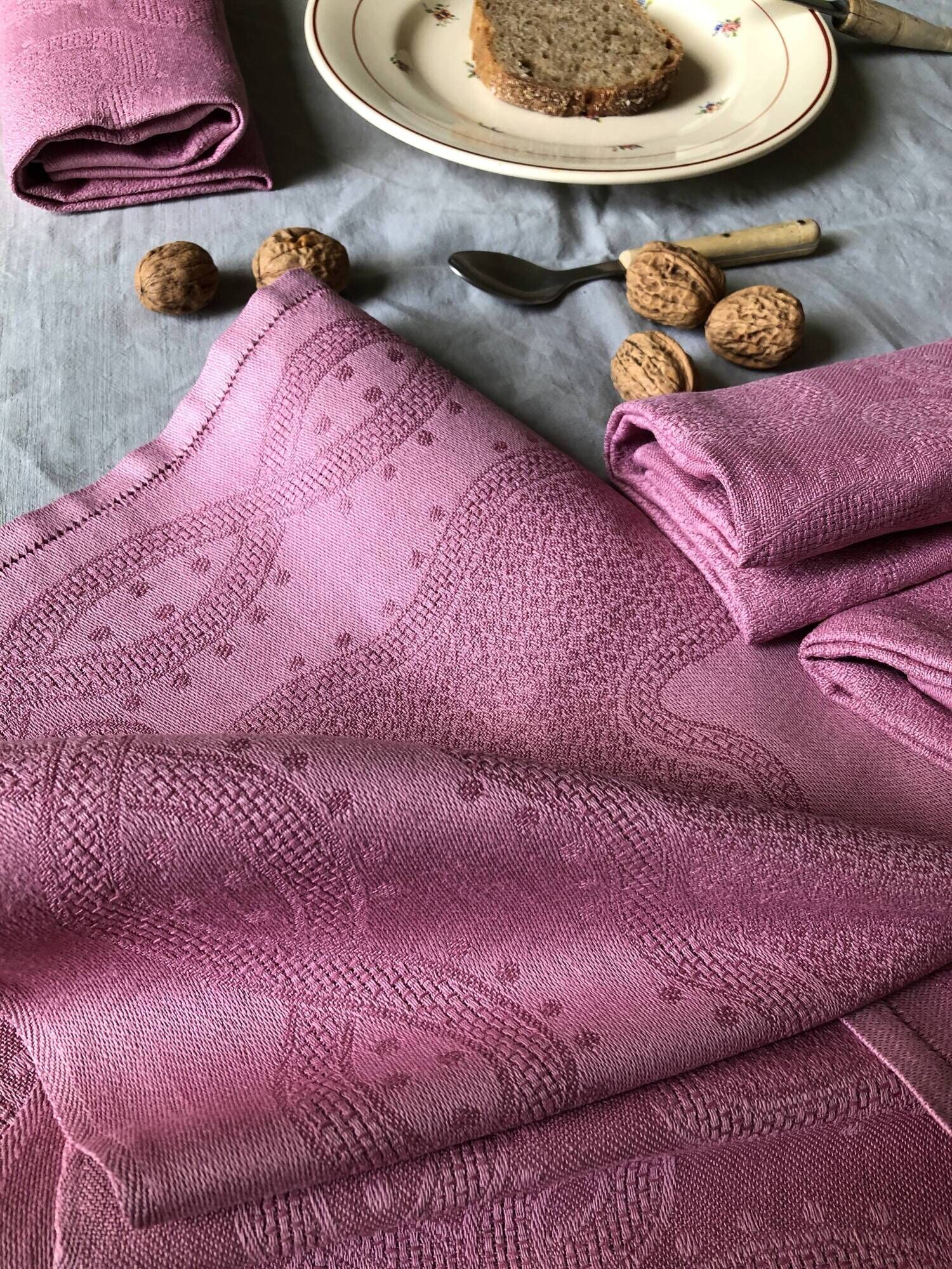 Set of four old damasked towels dyed cyclamen