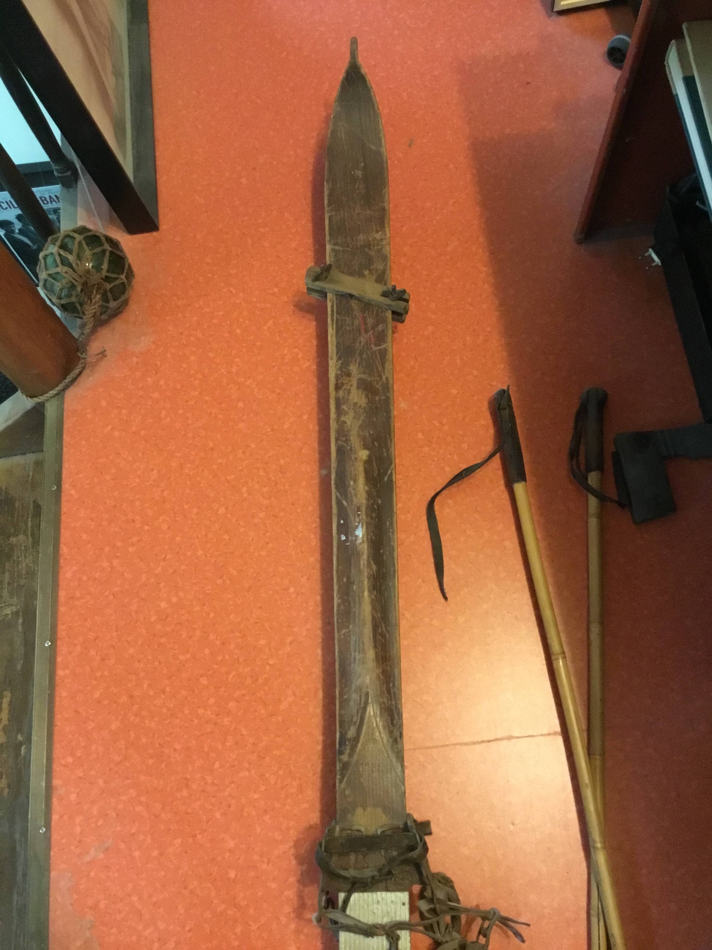 Pair of old skis and poles