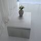 Table basse en aluminium brossé sculptural