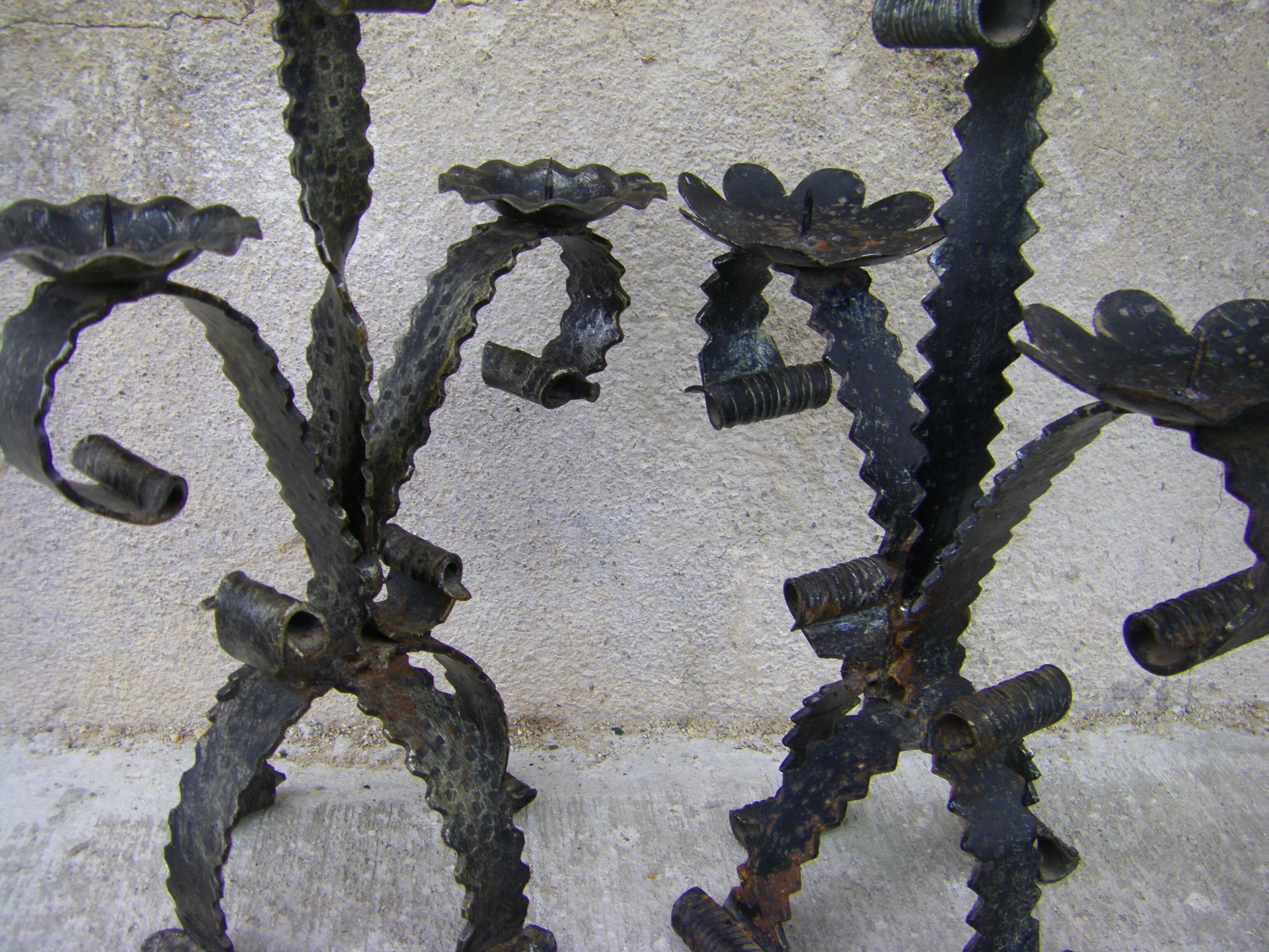 Two wrought iron chandeliers