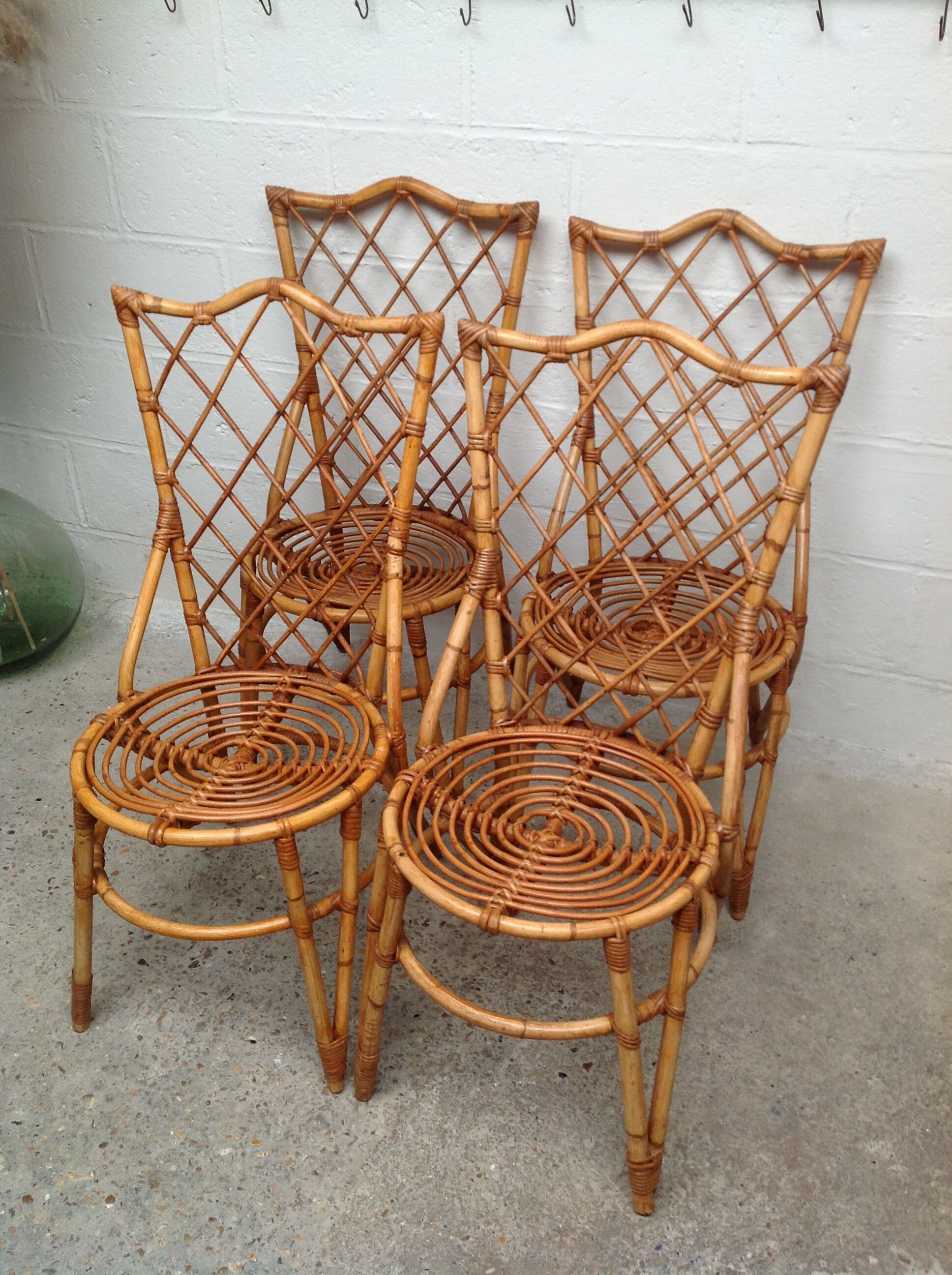 Rattan chairs by Louis Sognot