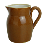 Pitcher or milk pot in speckled enamelled sandstone