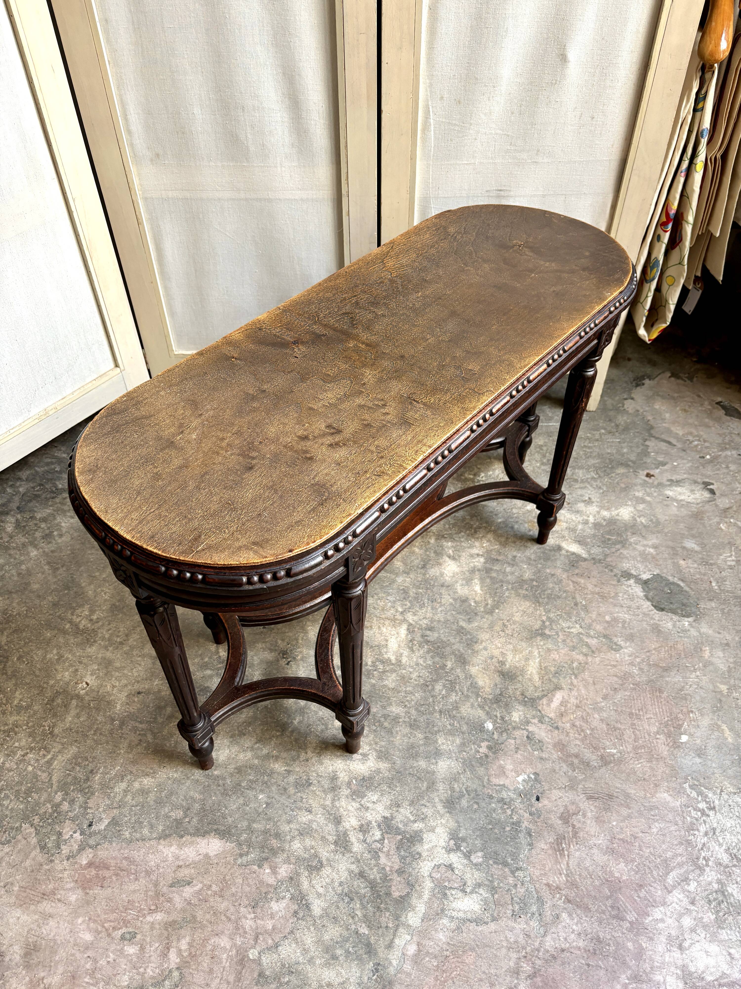 Dark wood piano bench
