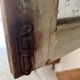 Antique dresser with glass doors and fleur-de-lys from the 50s