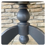 Coffee table with central leg in solid oak