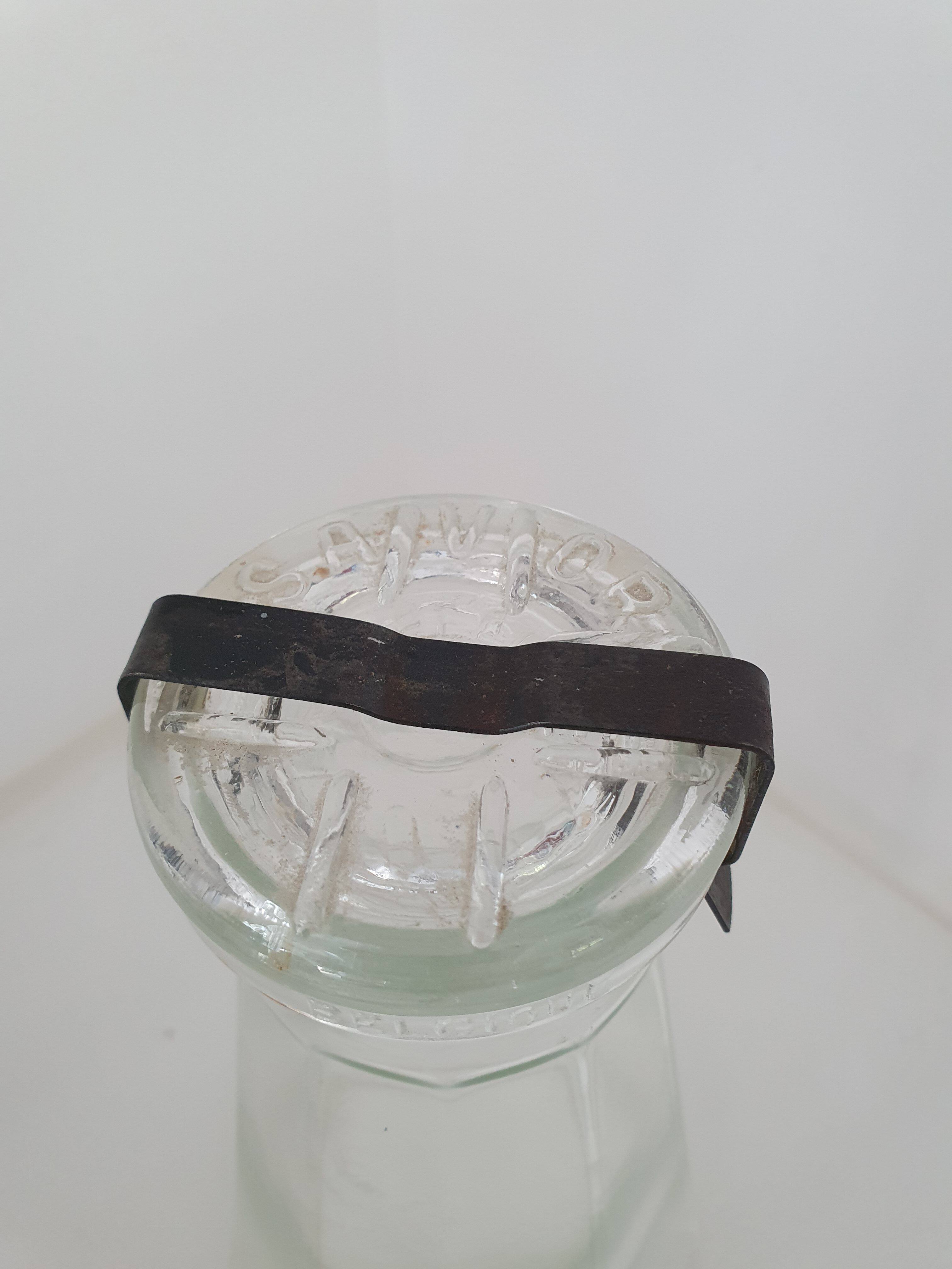 Glass jar with fastener