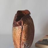 Signed textured terracotta vase