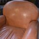Ensemble 2 fauteuils club en simili cuir camel 1980’s