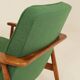Scandinavian modern chair in green wool, vintage wooden armchair.