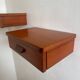 Vintage Scandinavian teak wall-mounted bedside tables.