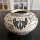 ceramic vase decorated by the artist René Poirot