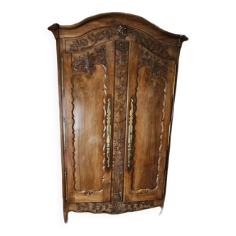 Wedding armoire carved with vine leaves