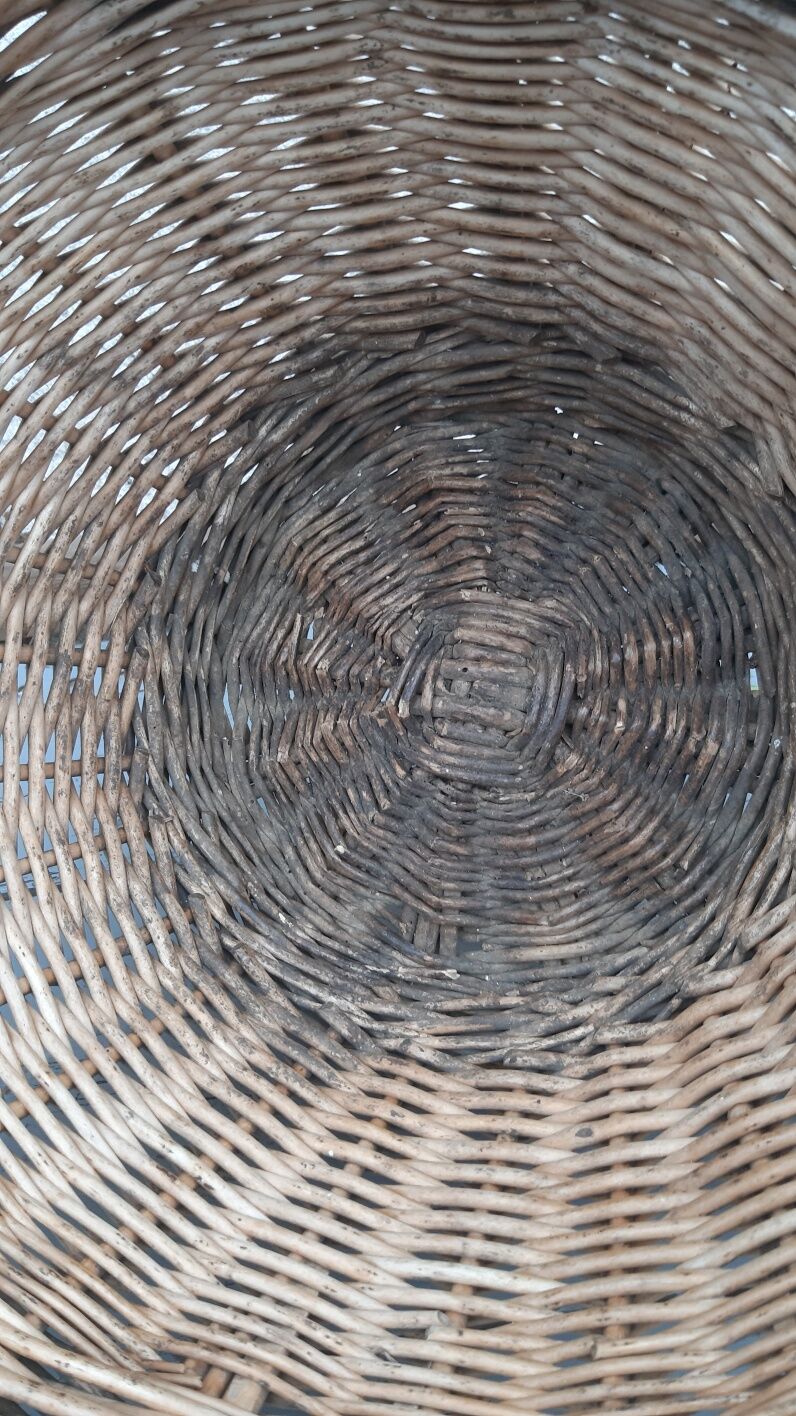 flat basket cut center table in woven metal