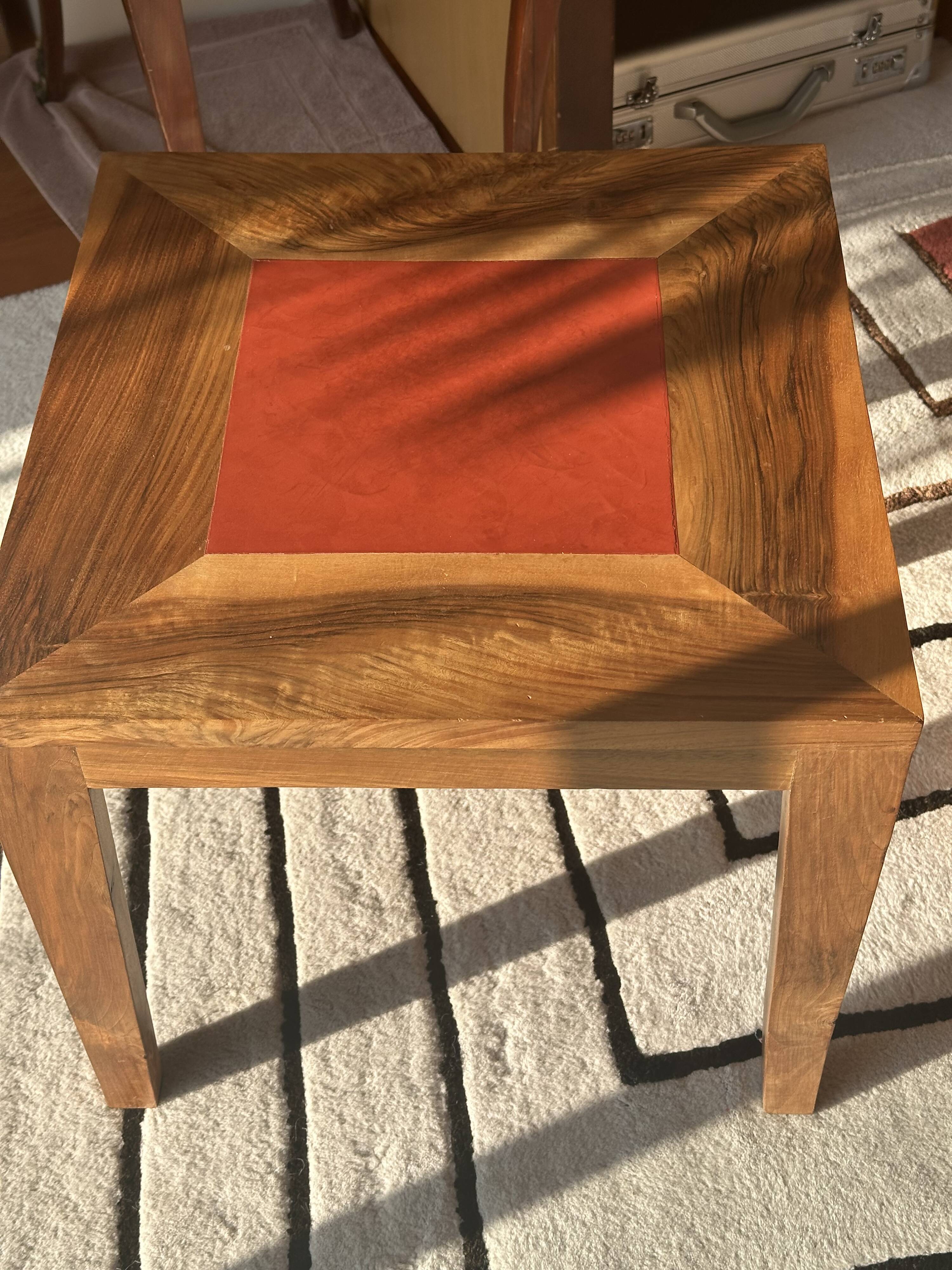 Coffee table in walnut with a tadelakt top.