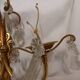 Antique wall lamp in gilded metal with cut crystal tassels
