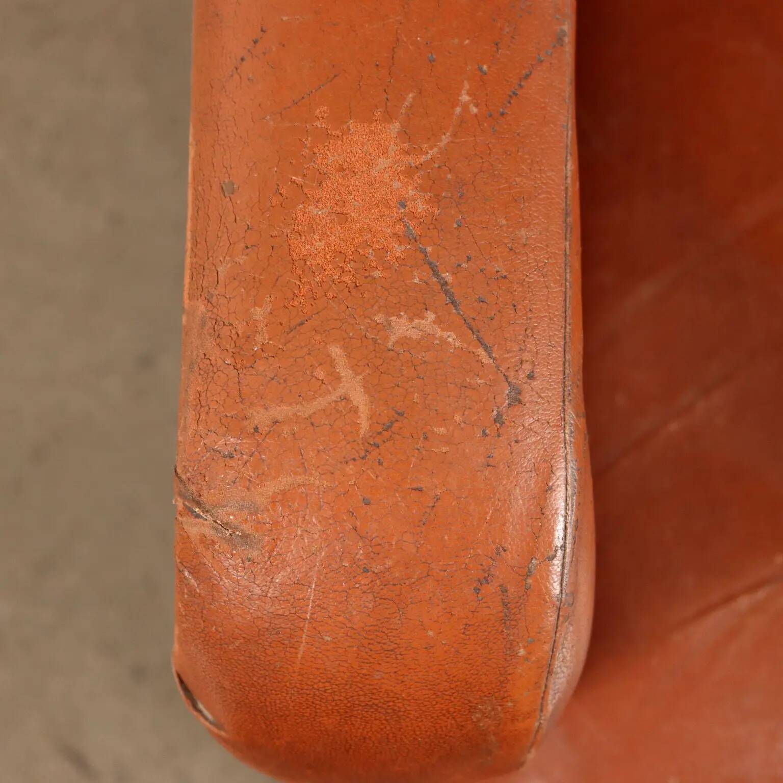 Vintage armchair from the 1970s in foam, faux leather, and metal.