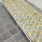 Folding deckchair camp bed