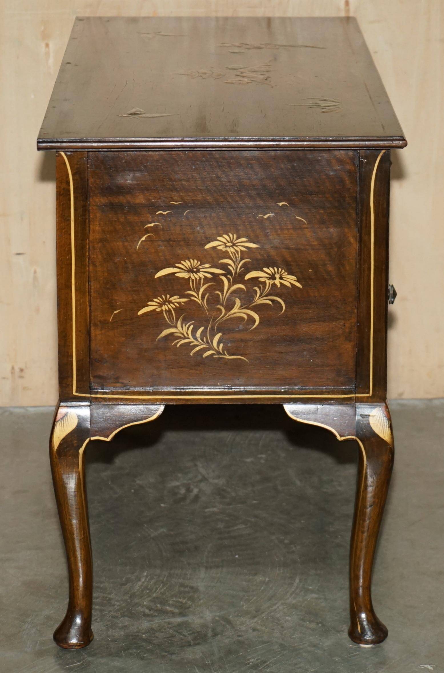 Chinese dresser circa 1920 in walnut with Chinoiserie decoration.