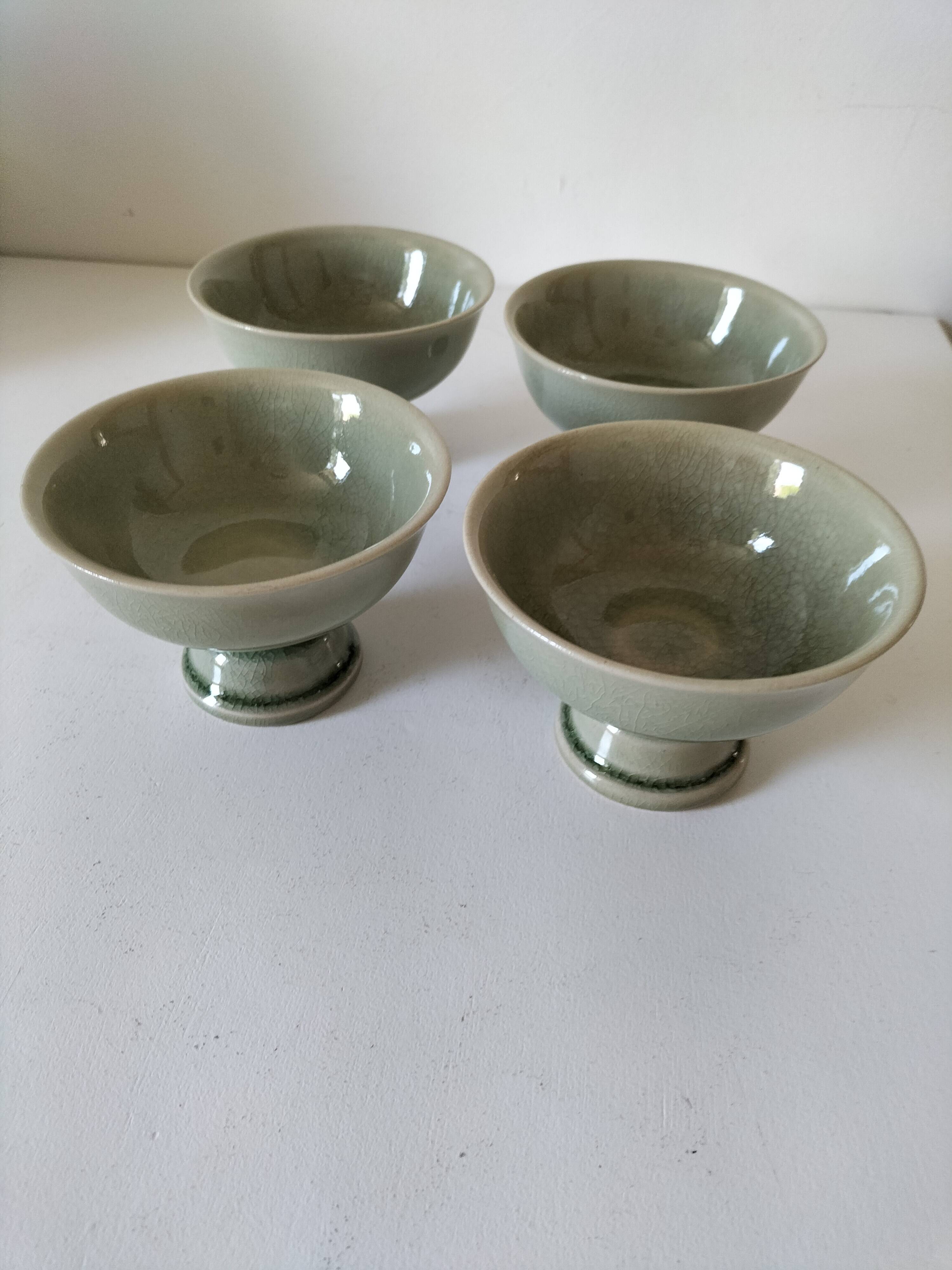 Set of 4 handmade ceramic bowls – celadon glaze & raku style