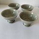 Set of 4 handmade ceramic bowls – celadon glaze & raku style
