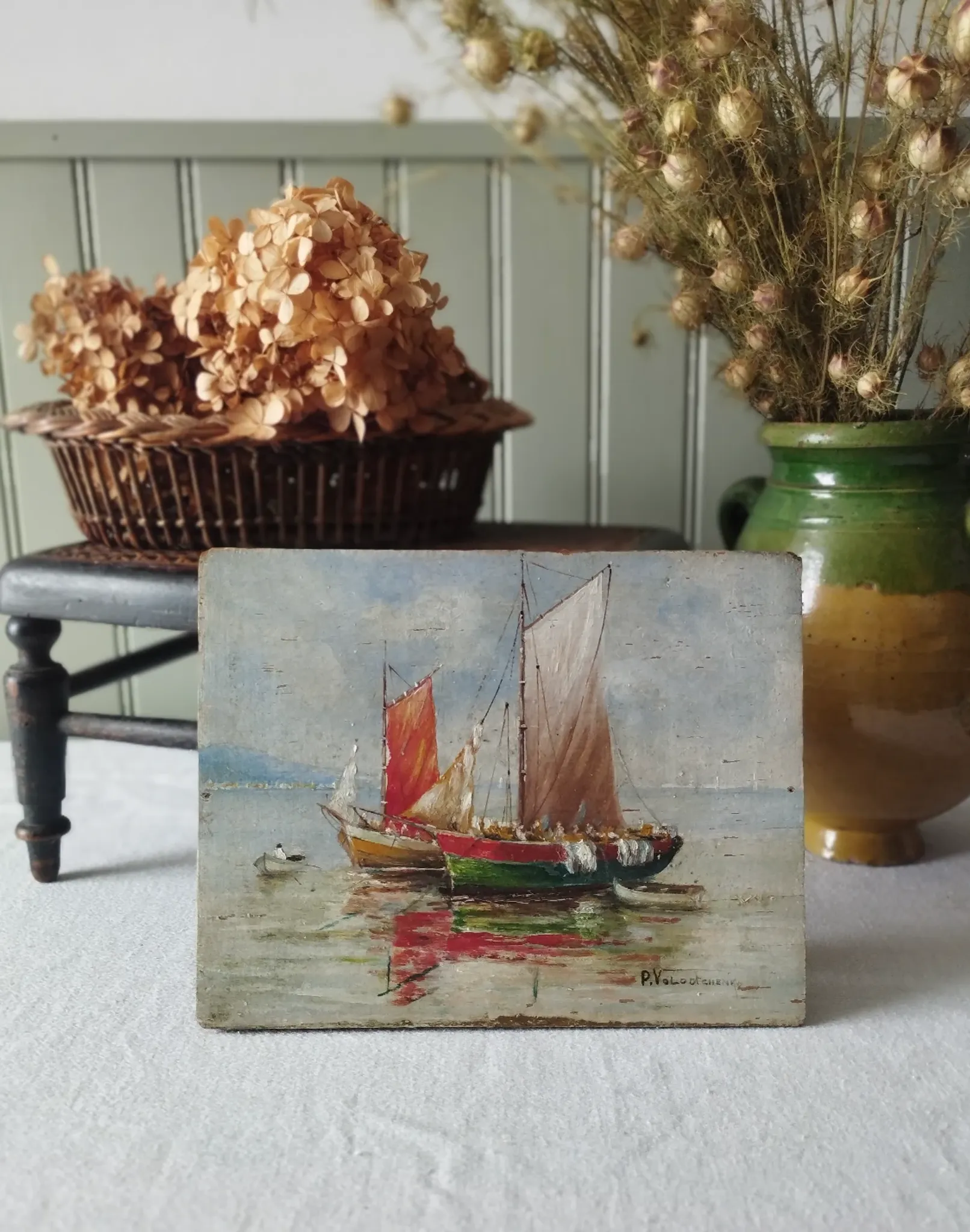Fishing boats on calm sea. oil painting signed p. volotchenko.