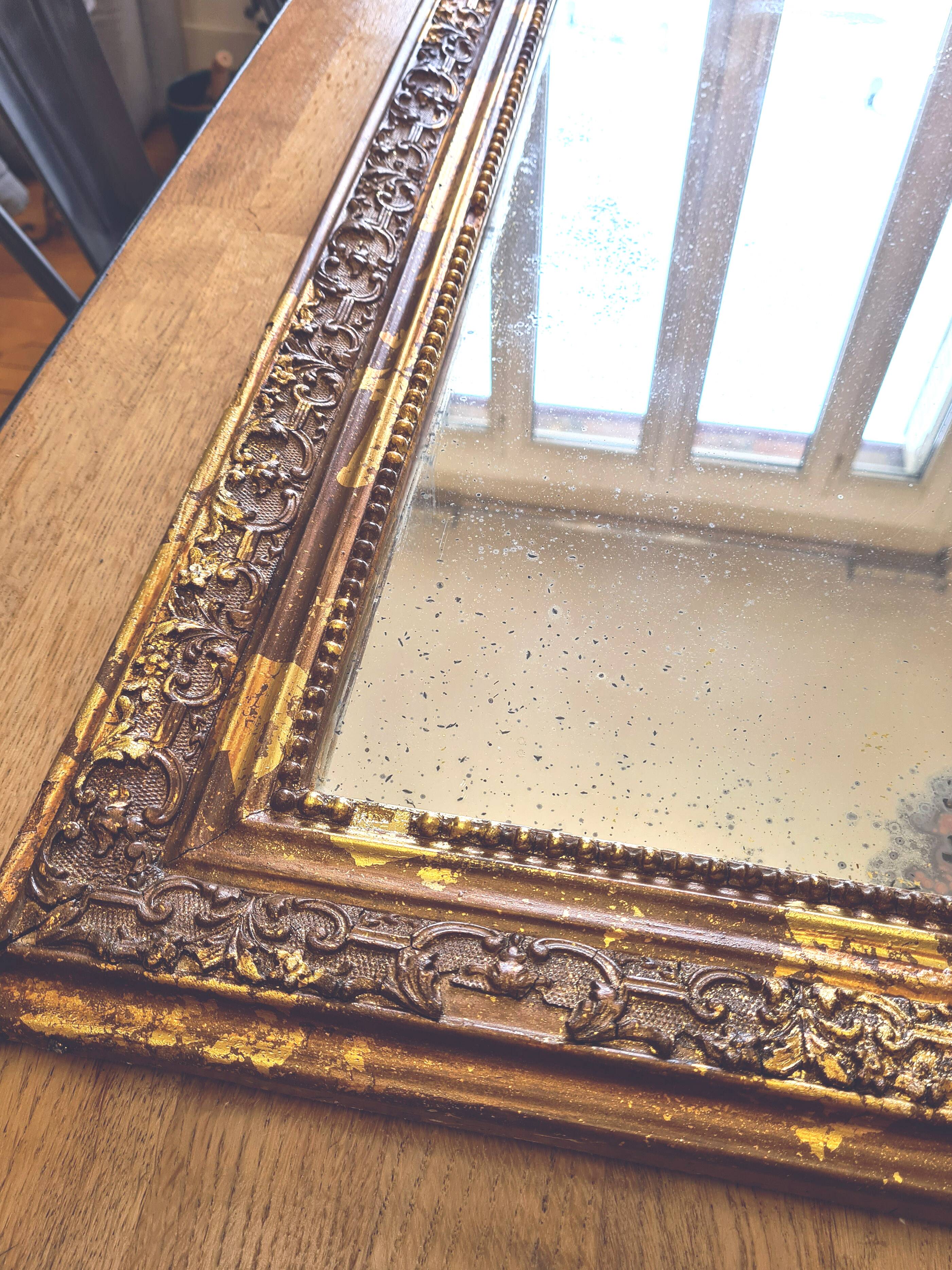 Old Louis Phillipe mercury mirror, in gilded stucco.