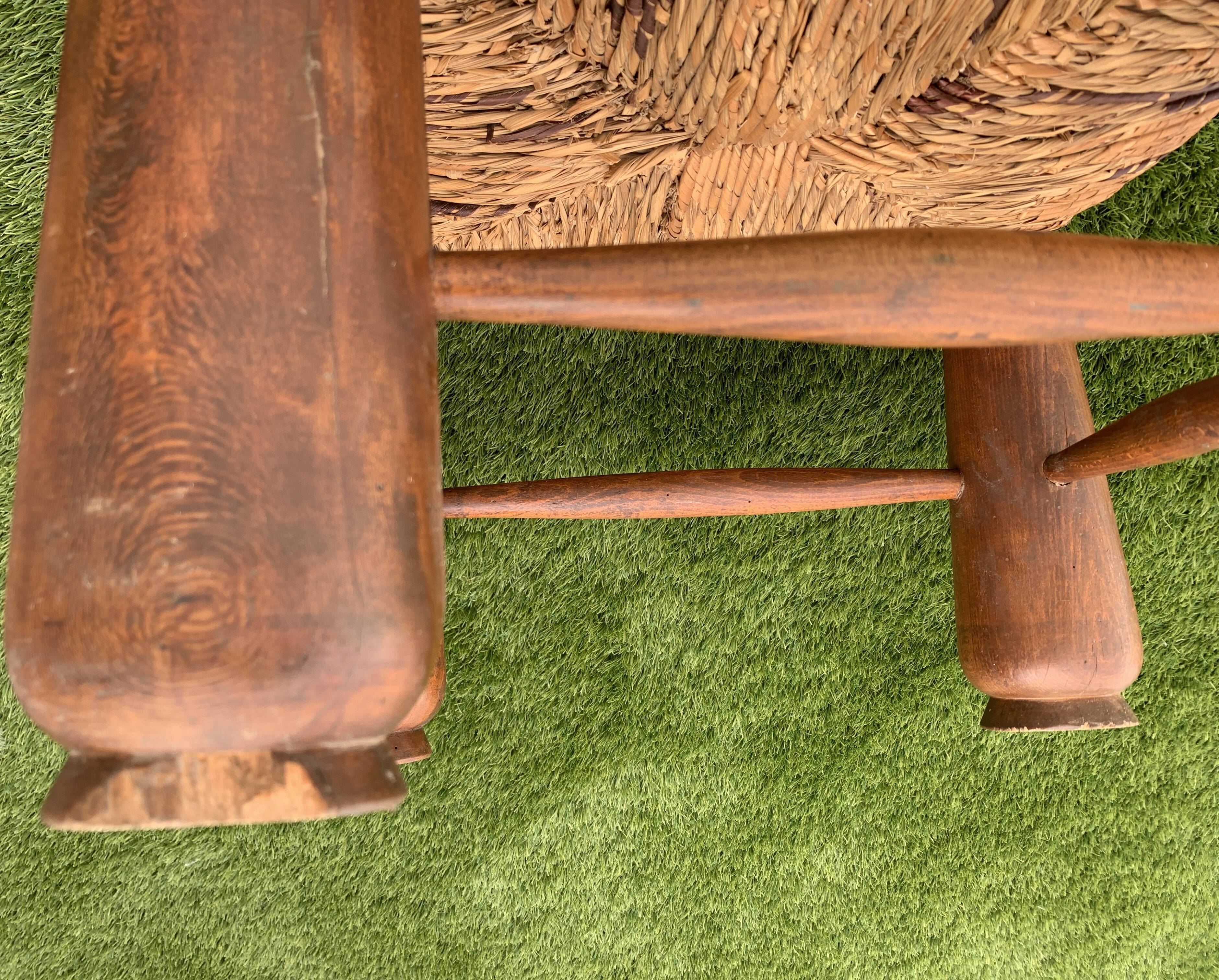 Pair of antique low fire chairs made of wood and straw