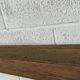Old oak shelf back of glass counter wall