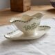 Antique sauce boat, ironstone, ivory with green floral and butterfly decoration.
