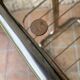 Glass and brass side table with magazine rack, circa 1970's