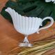 Porcelain and silver-plated gravy boat
