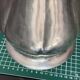 Pure tin sun vase at 95%, signed Jean Goardère.