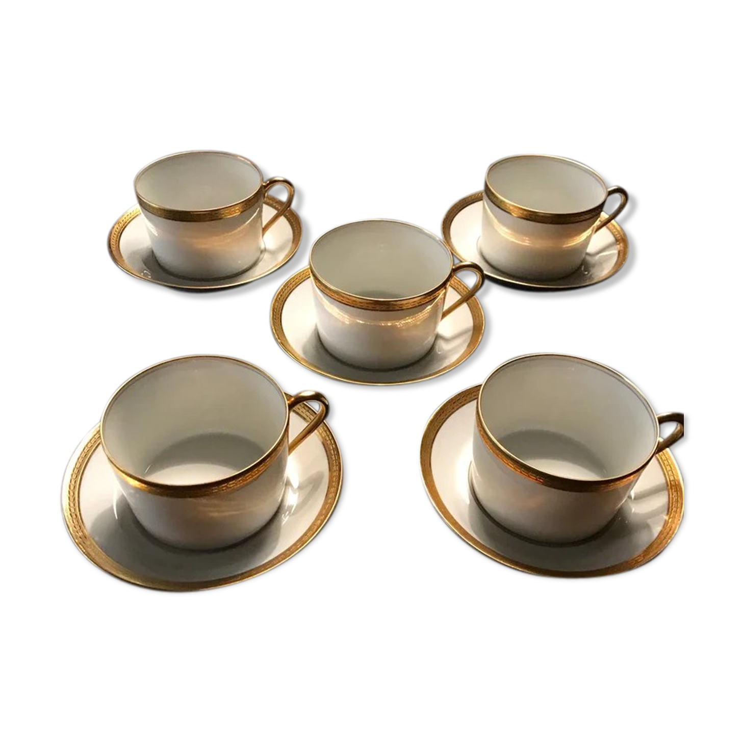 5 Haviland tea cups and sub-cups