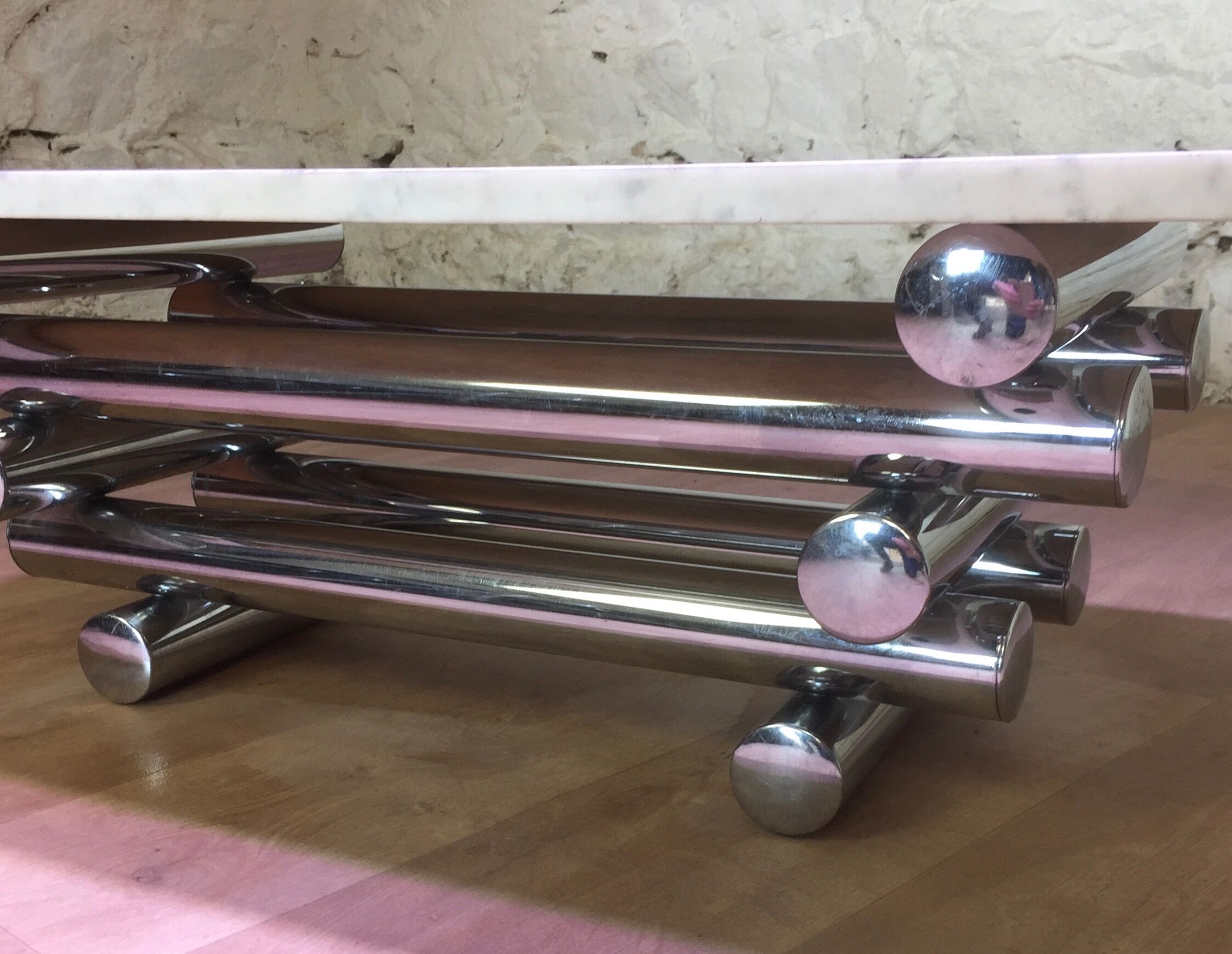 Coffee table with steel tube structure and marble top