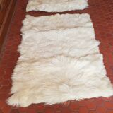 Beige goatskin rug in pair